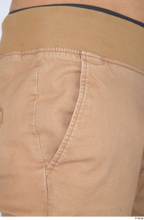 Turgen beige trousers casual dressed hips 0002.jpg